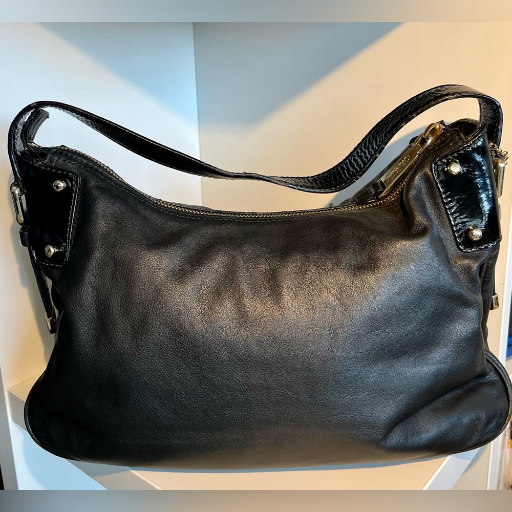 COLE HAAN Leather handbag, Black with gold accents; Good condition